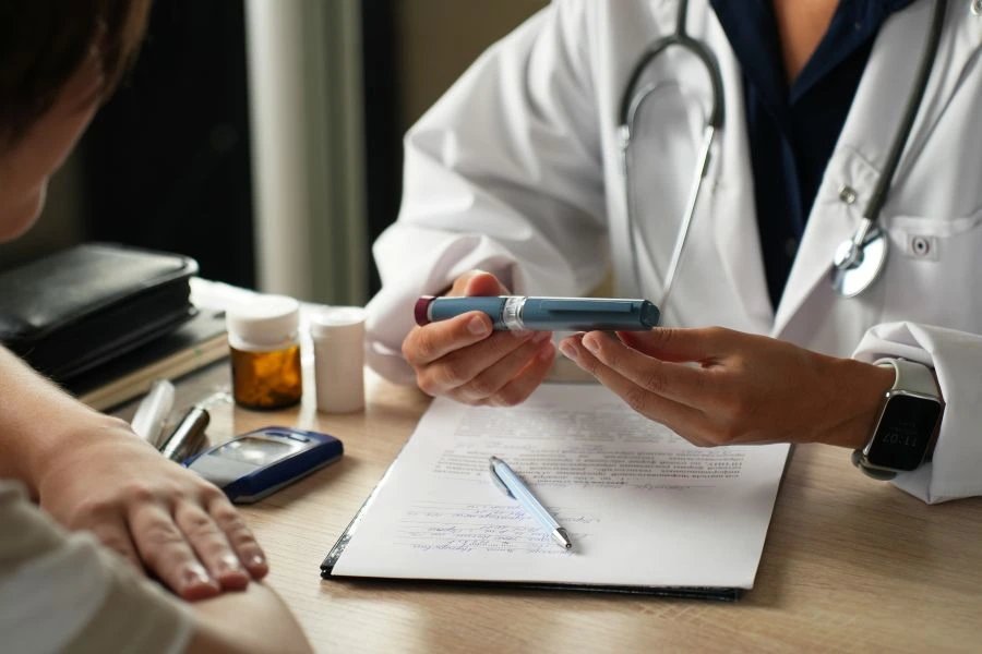 Doctor talking to patient about weight loss drugs